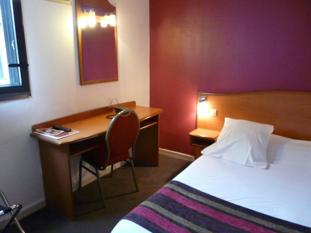 Kyriad Saint Quentin En Yvelines - Montigny Montigny-le-Bretonneux Quarto foto